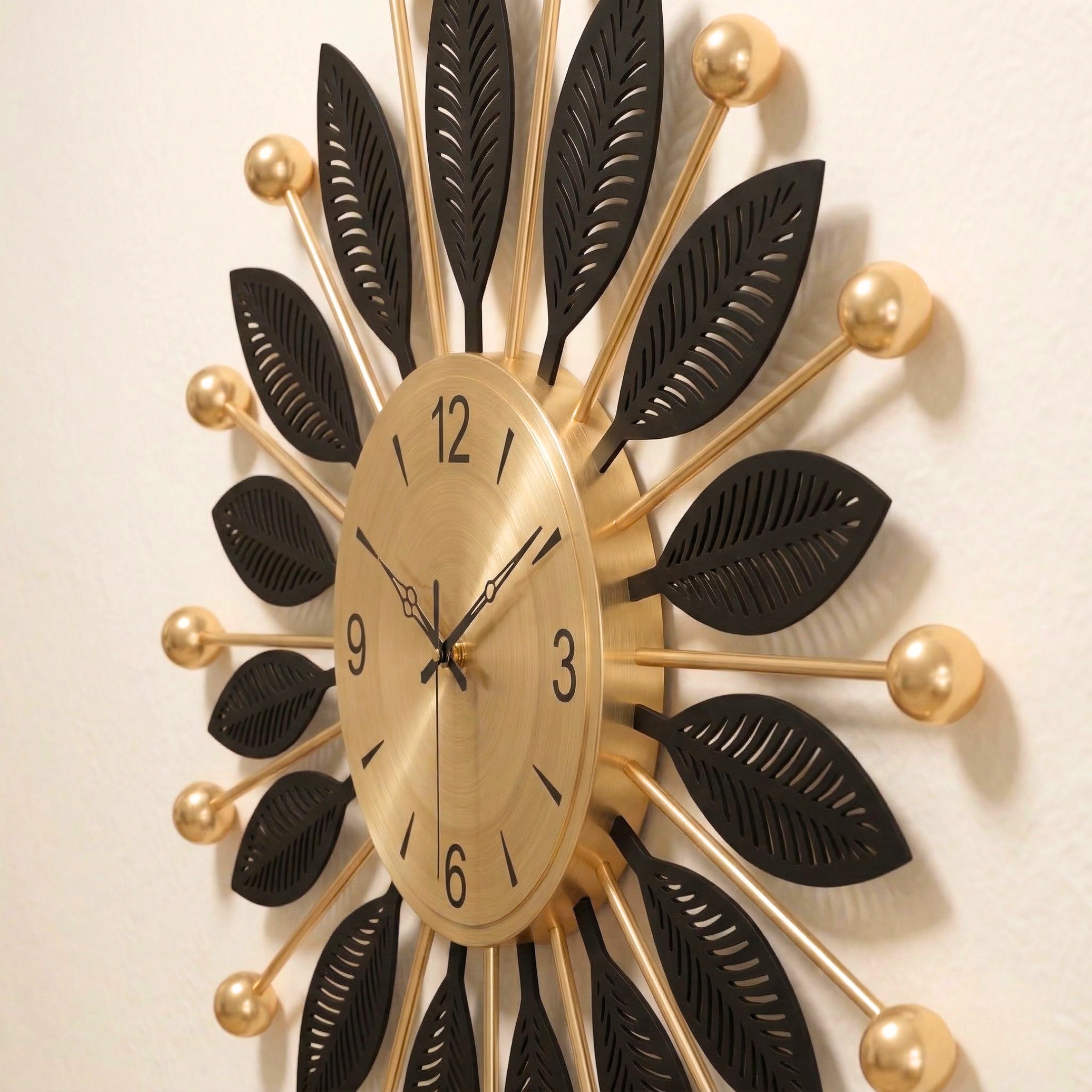 Luxury Black & Gold Metal Leaf Wall Clock â€“ Modern Decorative Silent Wall Clock for Living Room & Bedroom - Image 4